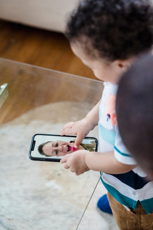 A Child Using a Phone