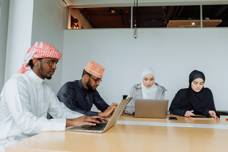Muslim People Working In An Office