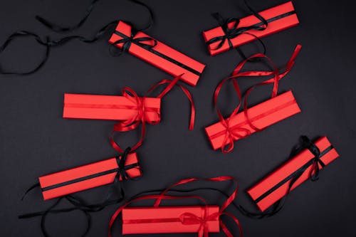 Free Red Wrapped Gift Boxes with Ribbons Stock Photo
