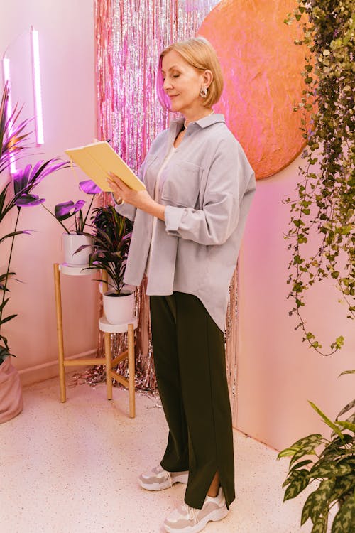 A Mature Woman Writing in a Journal