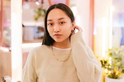 A Woman in Green Sweater