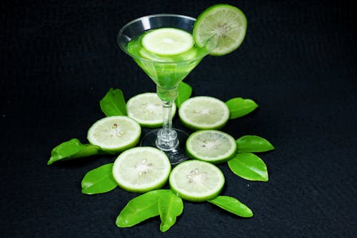 Clear Cocktail Glass With Sliced Lemon