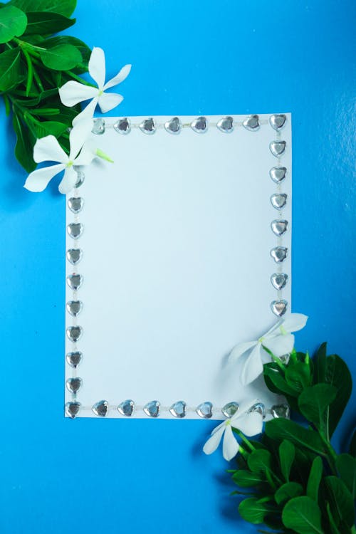 White Blank Paper on Blue Background