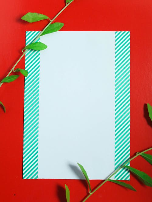 White Blank Paper on Red Background