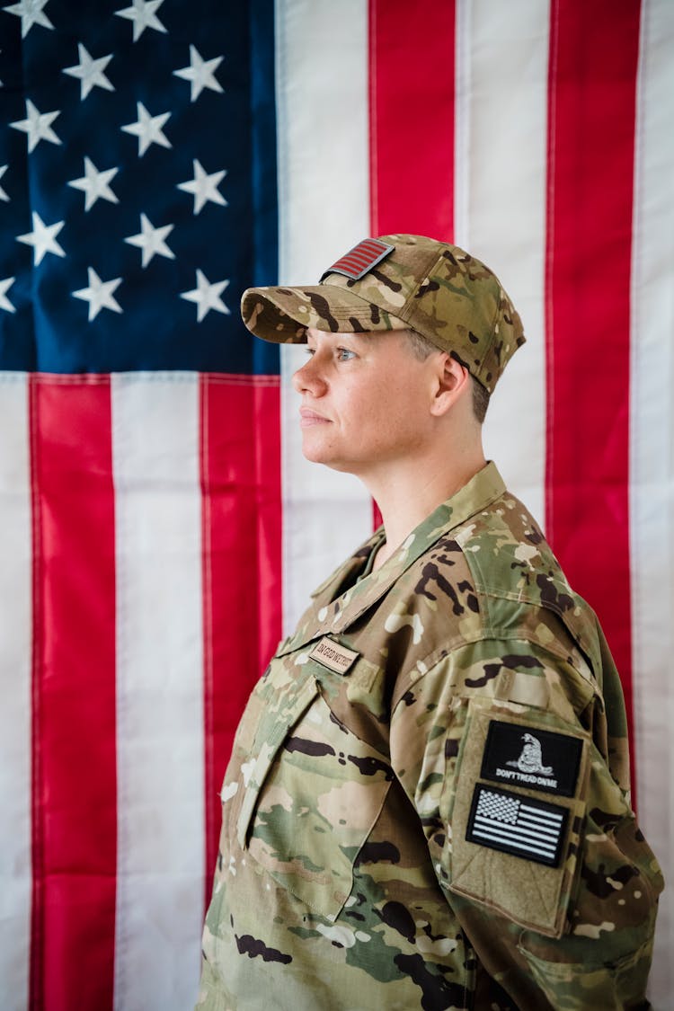 Person In Brown Camouflage Military Uniform