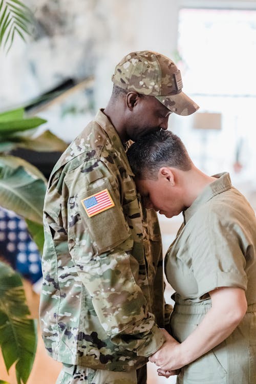 Woman Standing Leaning her Head on the Man's Chest 