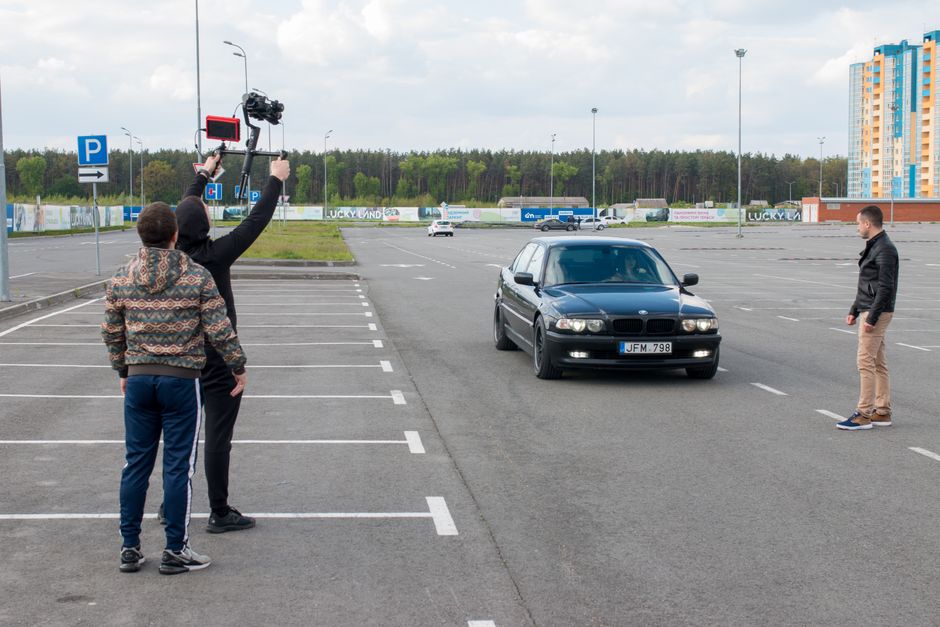 person filming parking lot