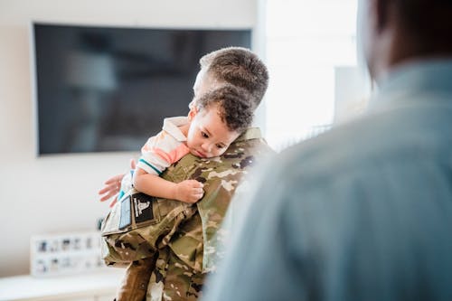 Person Carrying a Baby