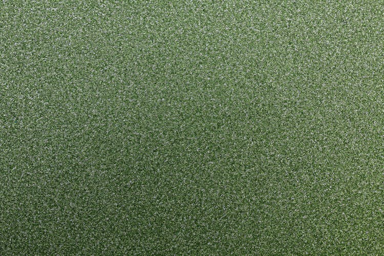 Texture Of A Green Synthetic Fabric