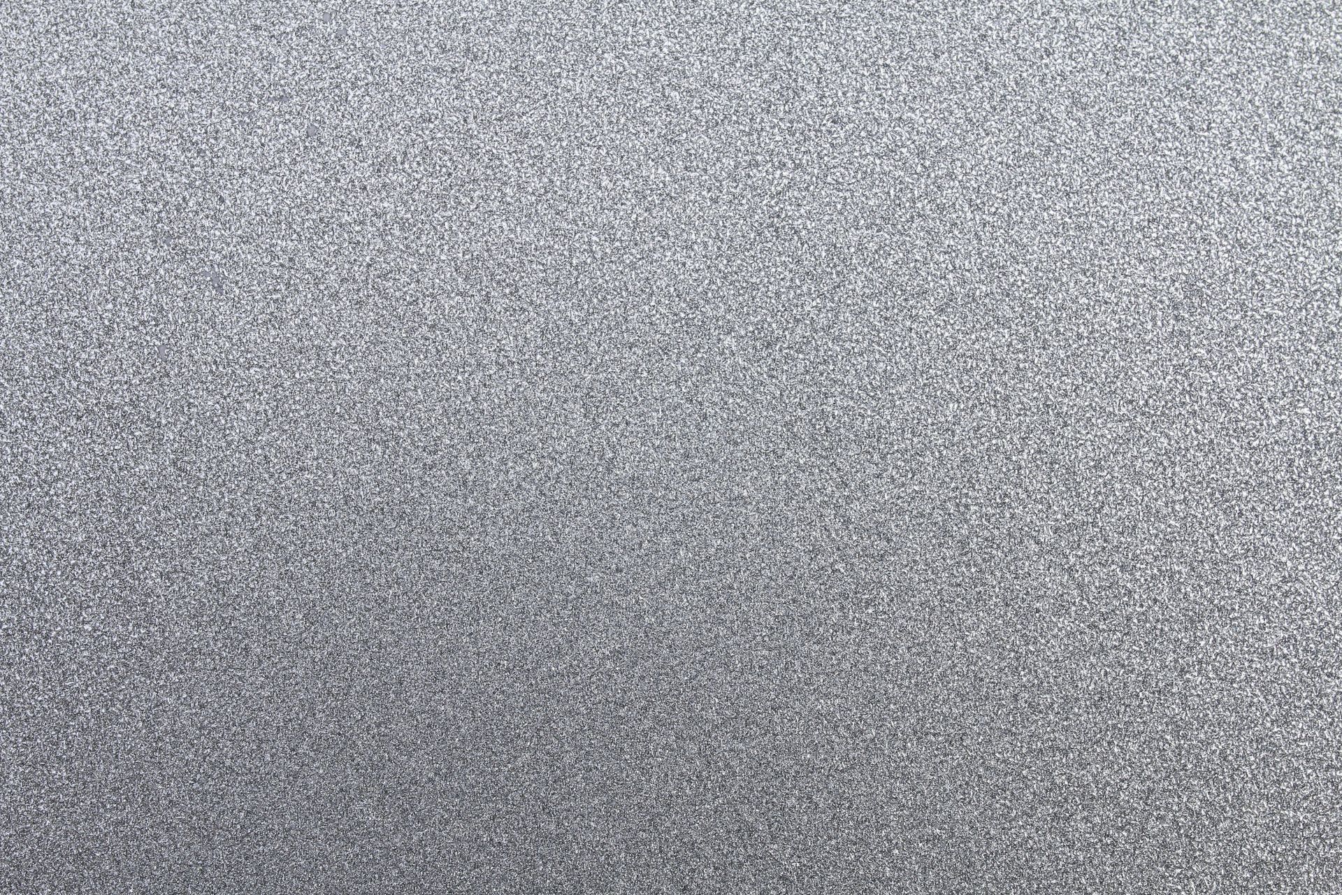 Detailed gray textured concrete wall, perfect for modern design needs.