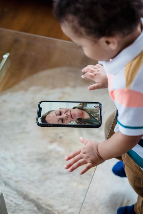 Smartphone on Clear Glass Table