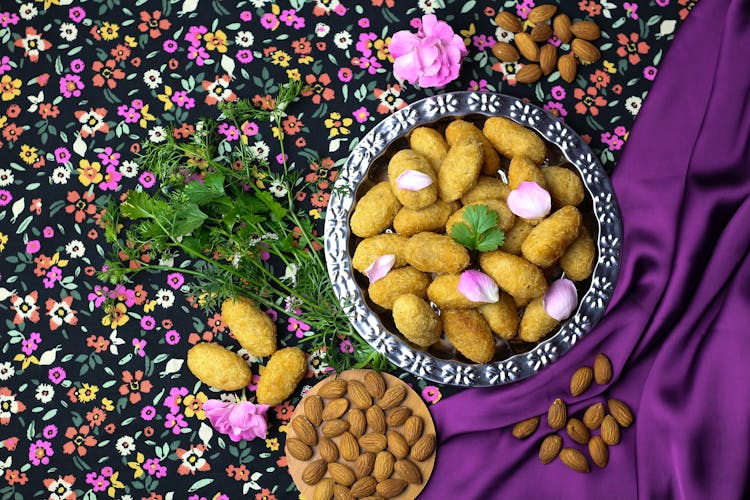 Traditional Food On Plate On Flower Background