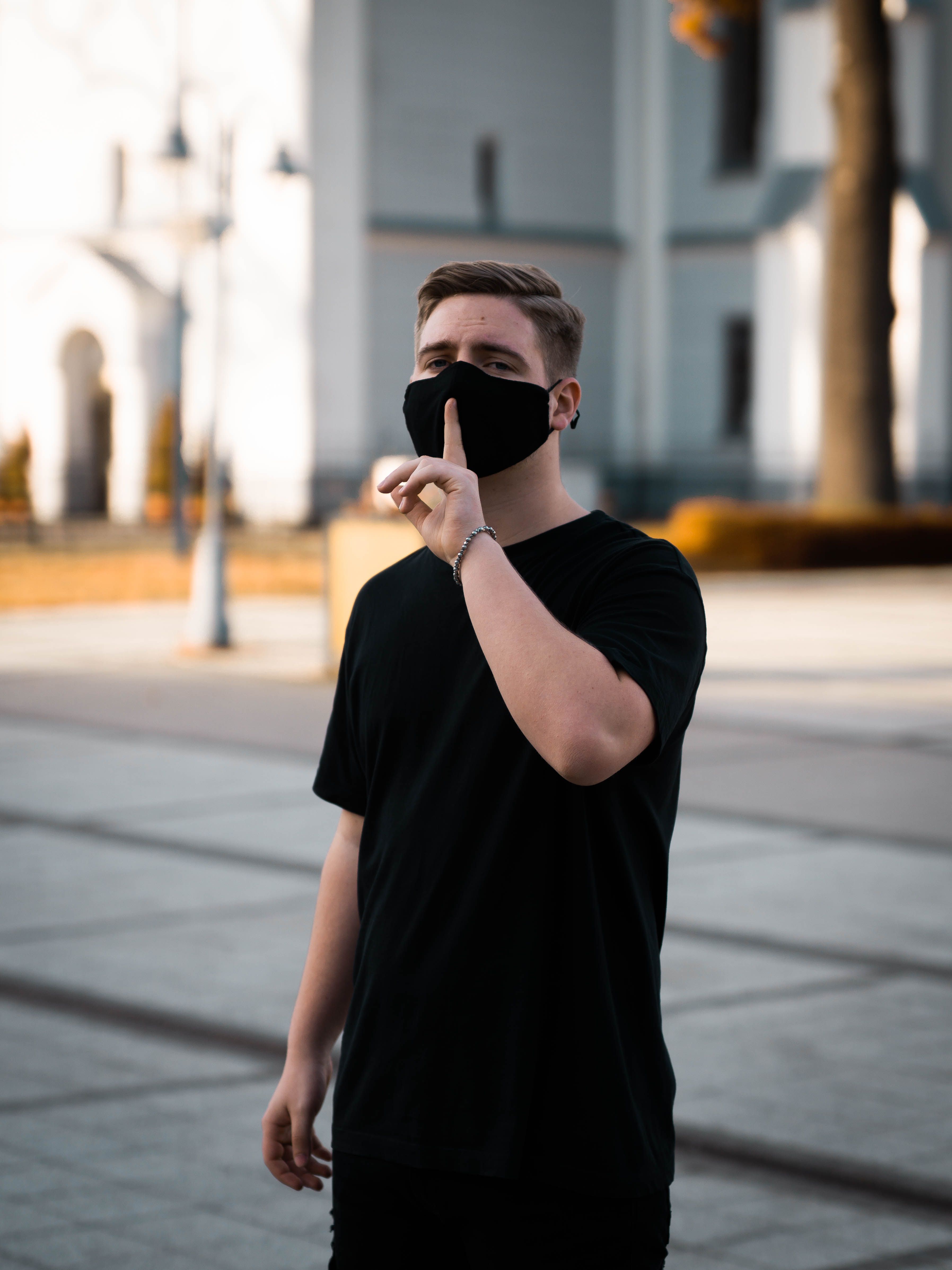 A Man in Black Shirt Wearing Black Face Mask · Free Stock Photo