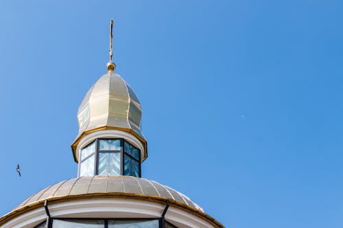 Dome Roof with Cross Under Blue Sky