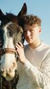 Man Touching a Horse