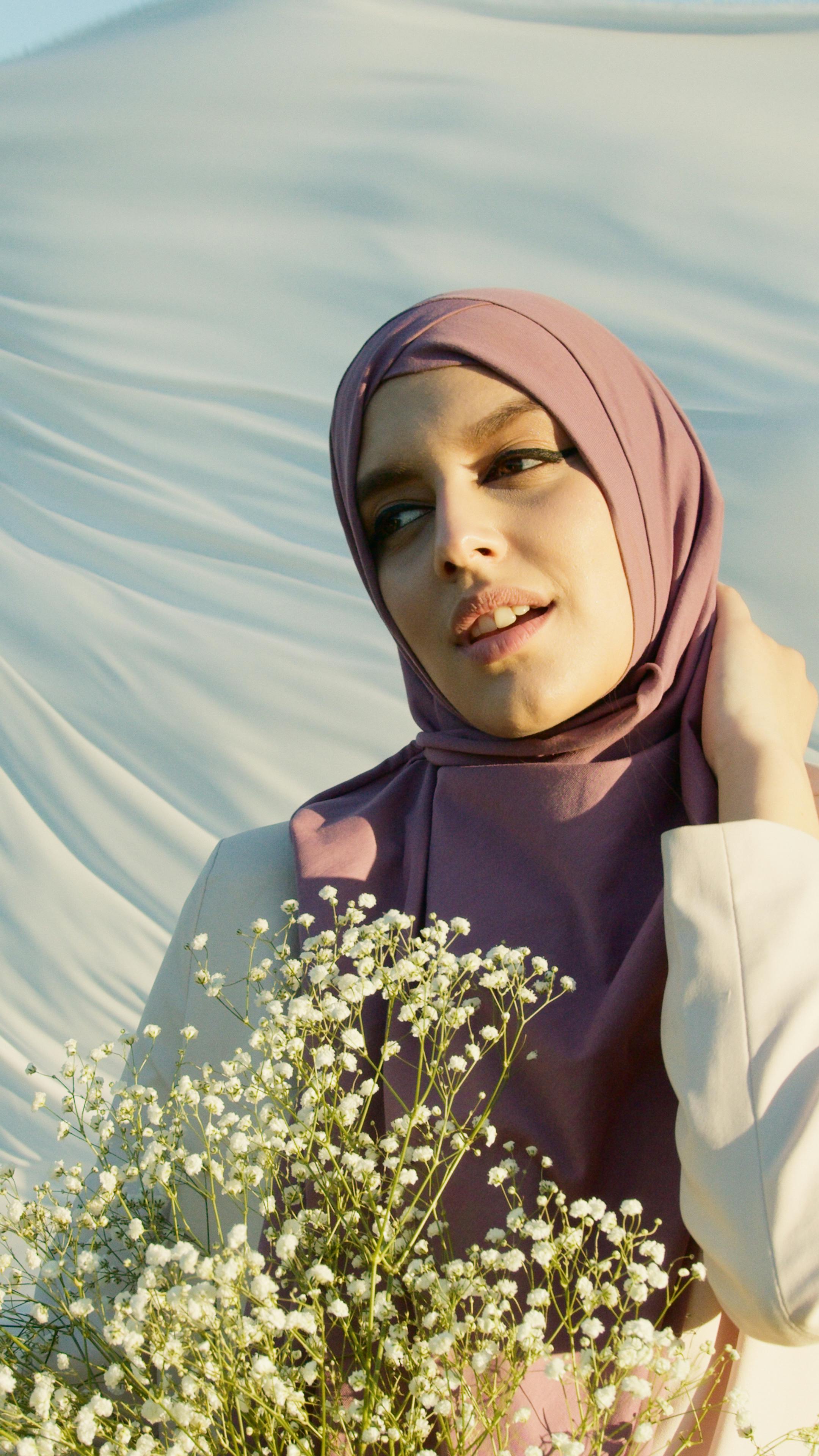 a woman in pink hijab