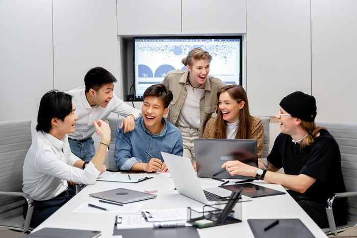 Studio meeting in full flow — Mikhail Nilov on Pexels