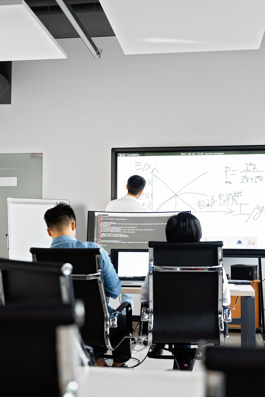 Team brainstorming at a whiteboard