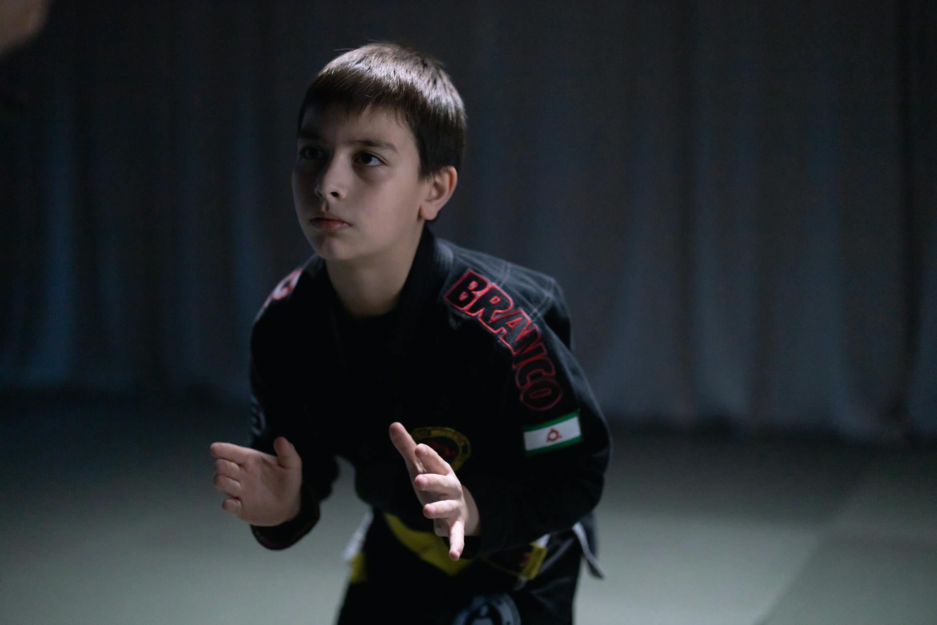 A Boy in Black Kimono Looking Afar