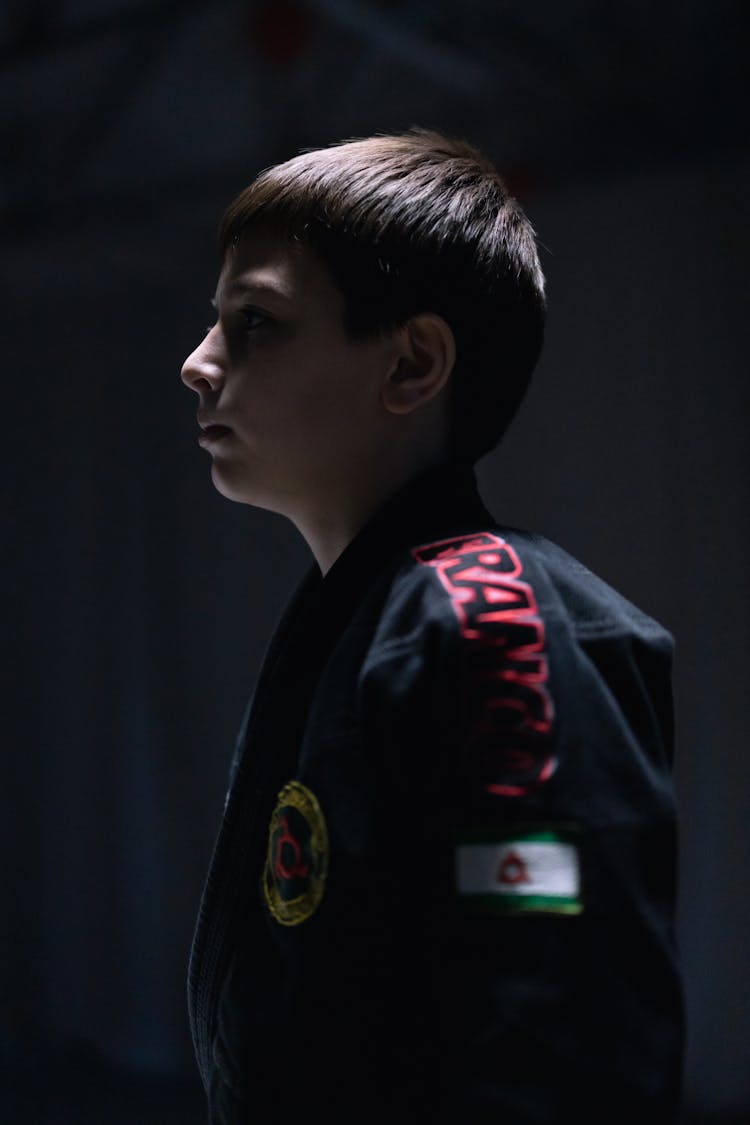 Side View Shot Of A Boy Wearing Black Kimono 