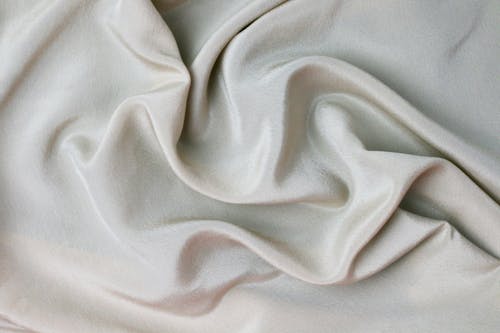 Free Rippled White Shiny Textile Surface Stock Photo