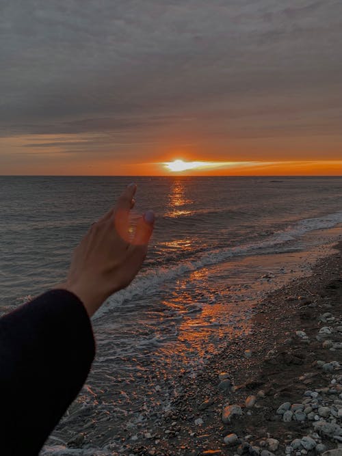 Sunset View in the Horizon from the Beach Shore 