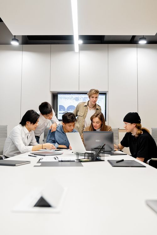Group of People Using Laptop Computer · Free Stock Photo