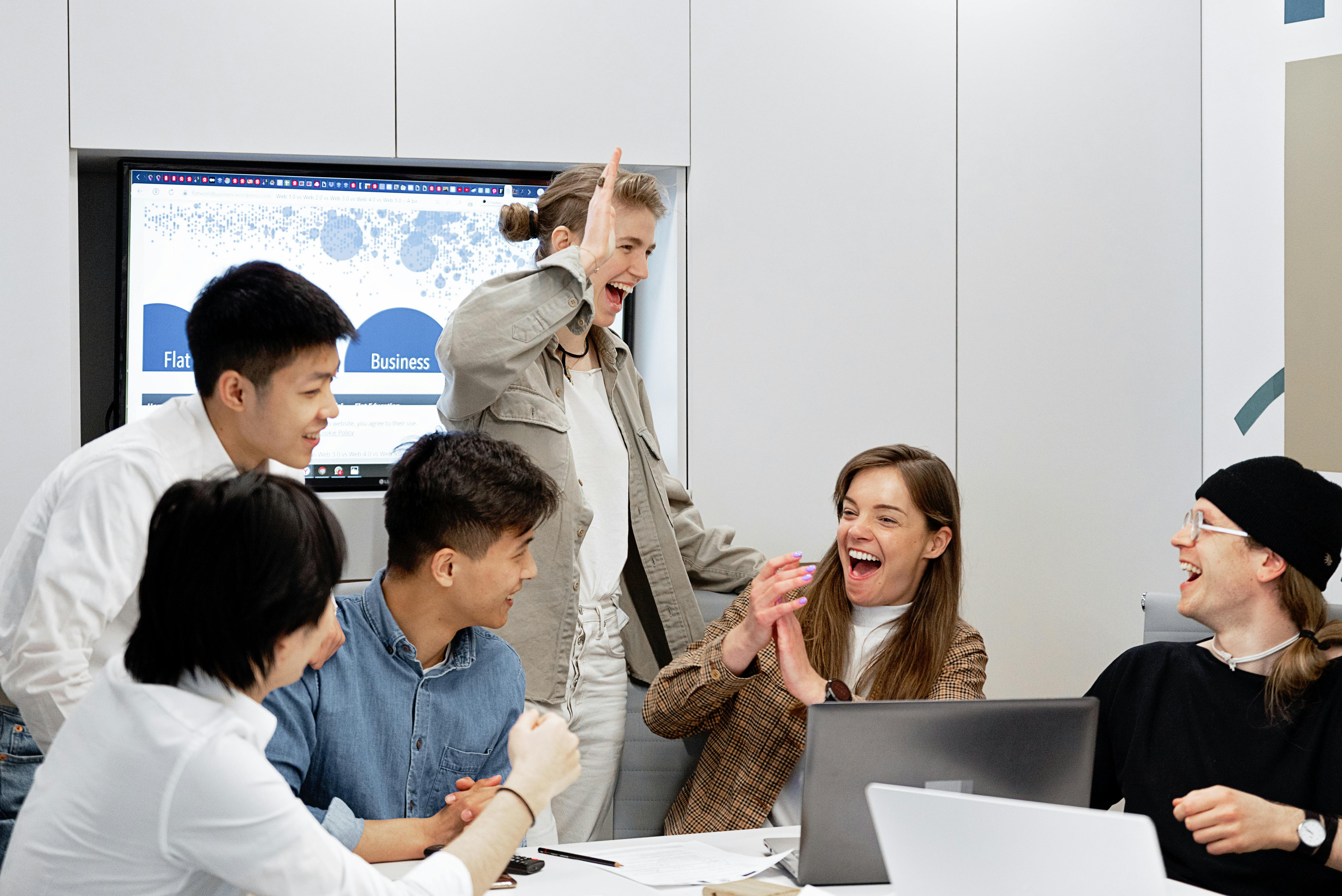 Happy People in the Office · Free Stock Photo