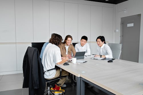 Free Young Business People in a Meeting Stock Photo