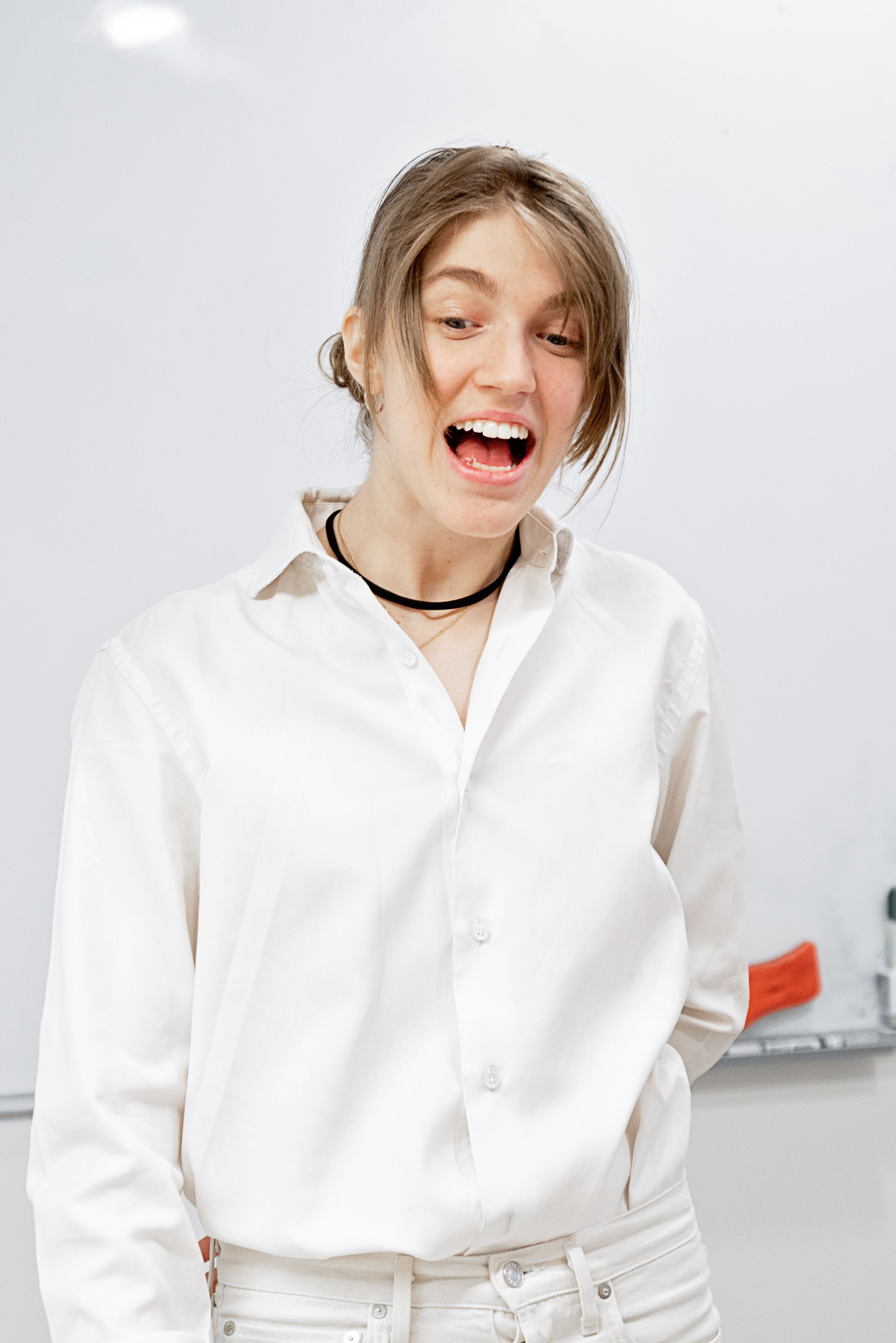 Woman in White Long Sleeve Shirt Standing · Free Stock Photo