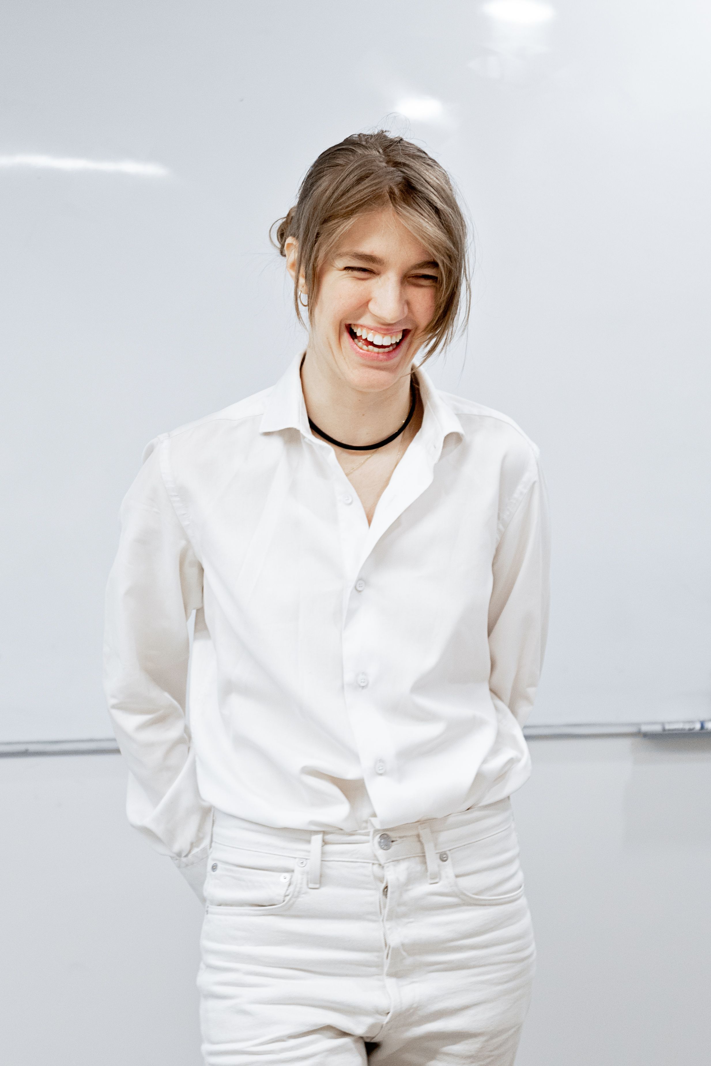 Woman in White Long Sleeve Shirt Smiling · Free Stock Photo