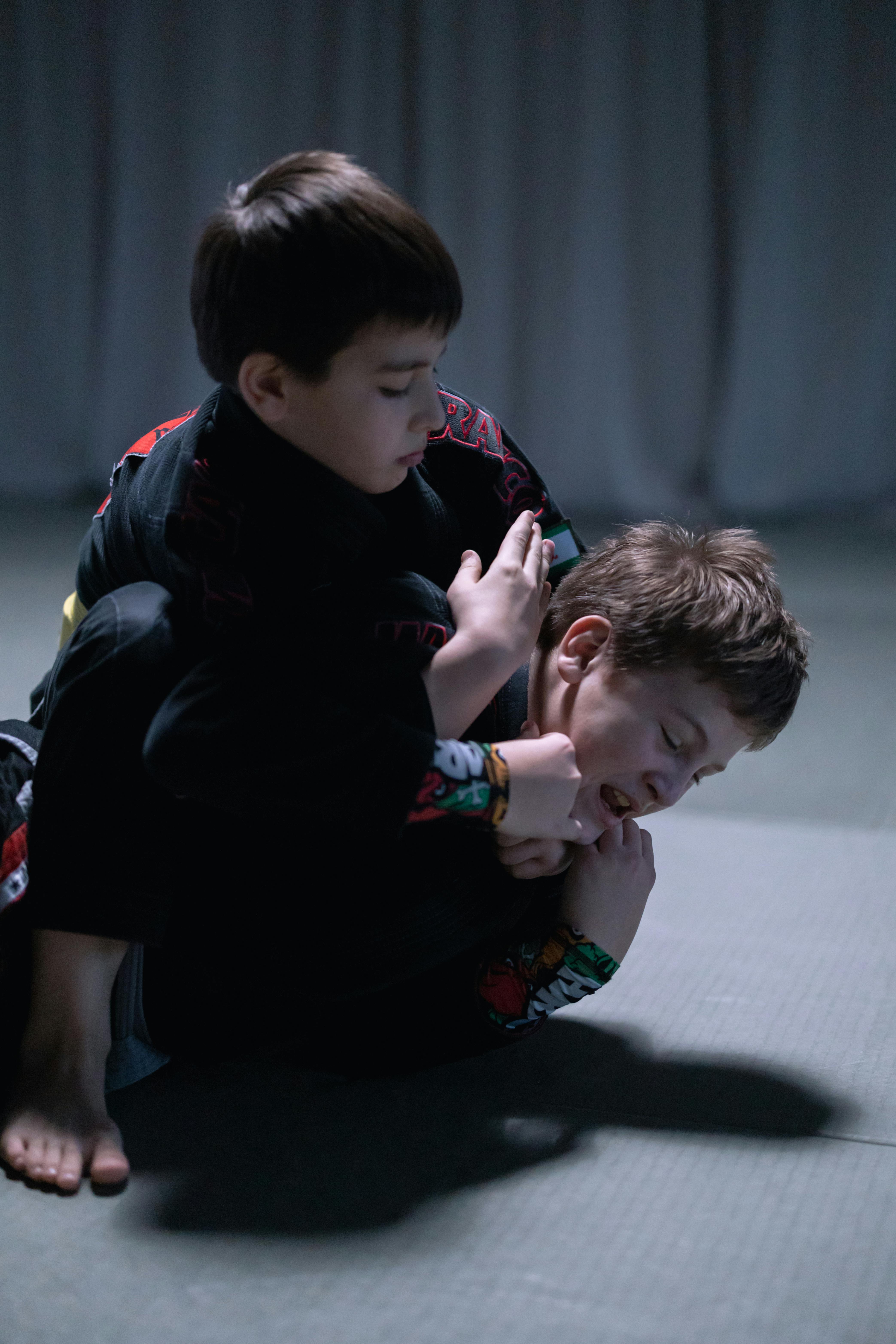 boys practicing jiu jitsu