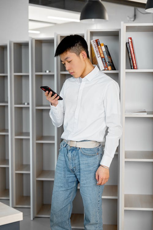 A Man Looking at His Cellphone