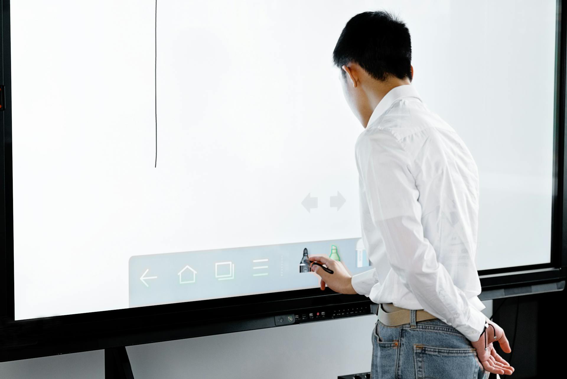 A Person Using an Interactive Whiteboard