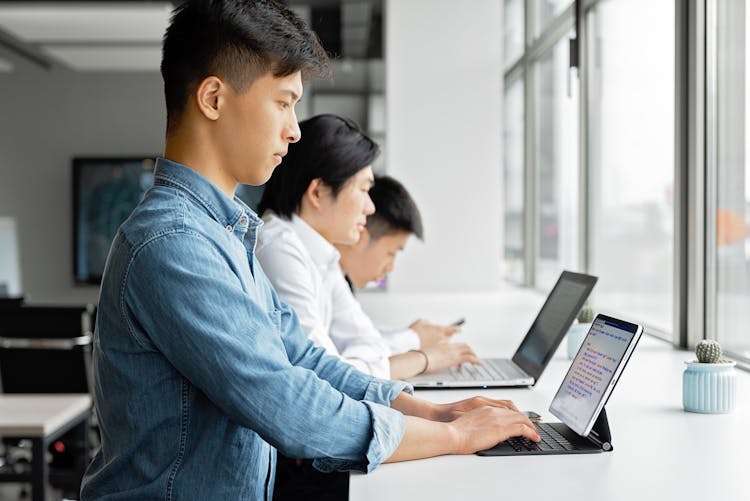 Men Working In The Office Counter