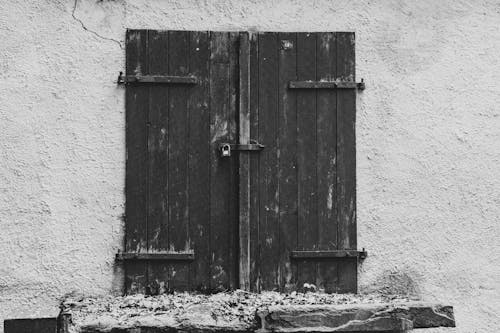 Free Grayscale Photo of Wooden Door with Lock Stock Photo