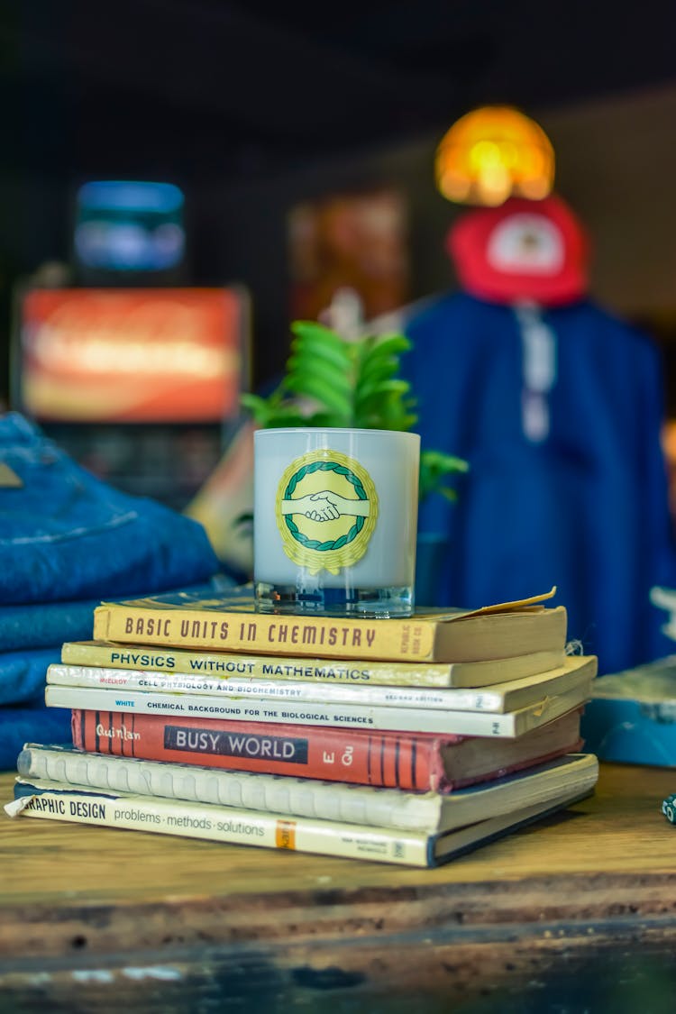 Stack Of Books On Wooden Table