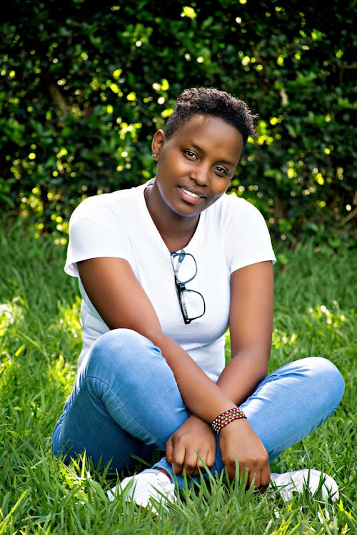 A Woman Sitting on the Grass 