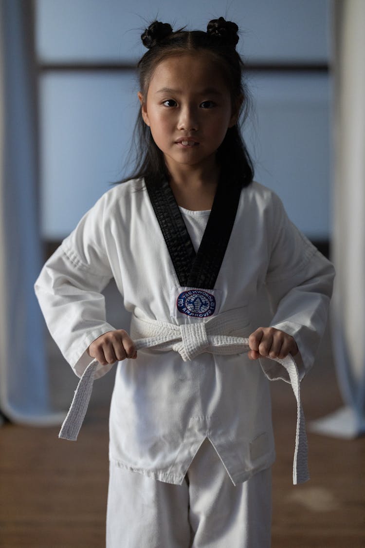 A Girl In White Taekwondo Uniform