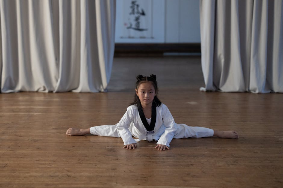 A Cute Girl Splitting on a Wooden Surface