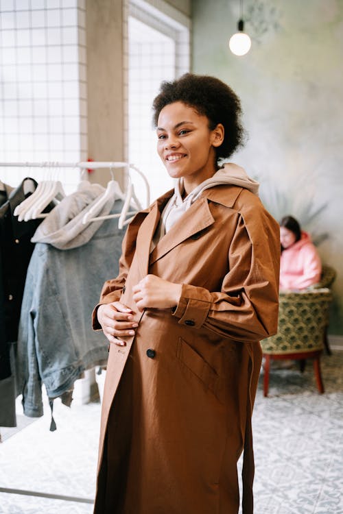 A Woman Wearing a Brown Trench Coat