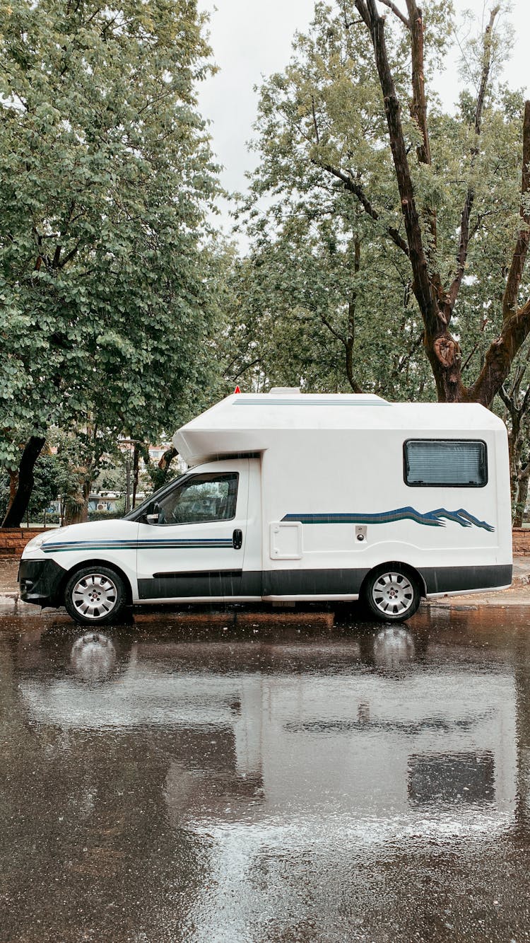 Mini Camper Parked On Wet Road