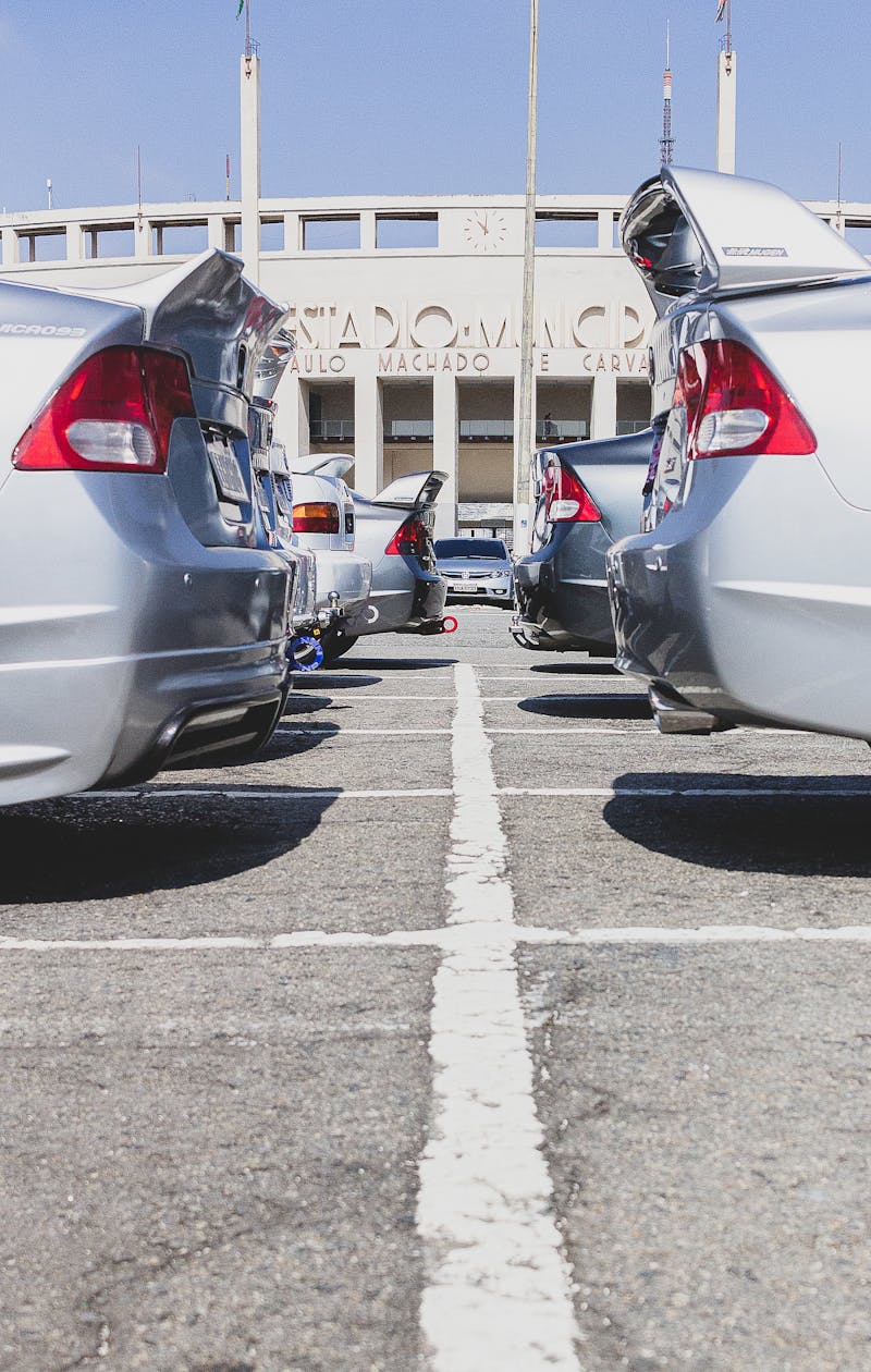 Officer reviewing manuals and checklists on a ship's bridge