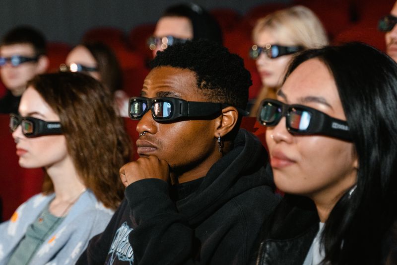 A small theater of 100 people representing 100 YouTube subscribers