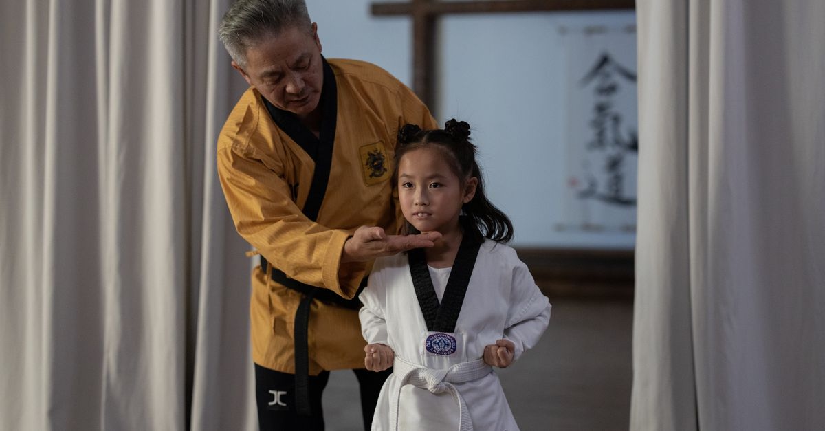 students training in martial arts at a school in Ho Chi Minh City with traditional uniforms