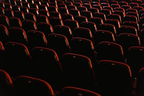 Empty Seats of the Chairs inside the Movie Theater