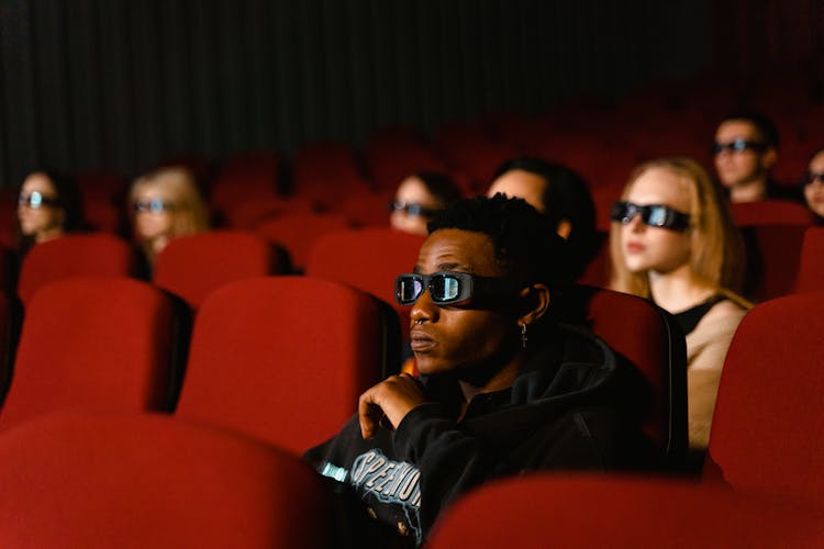 People Wearing 3d Glasses In A Cinema