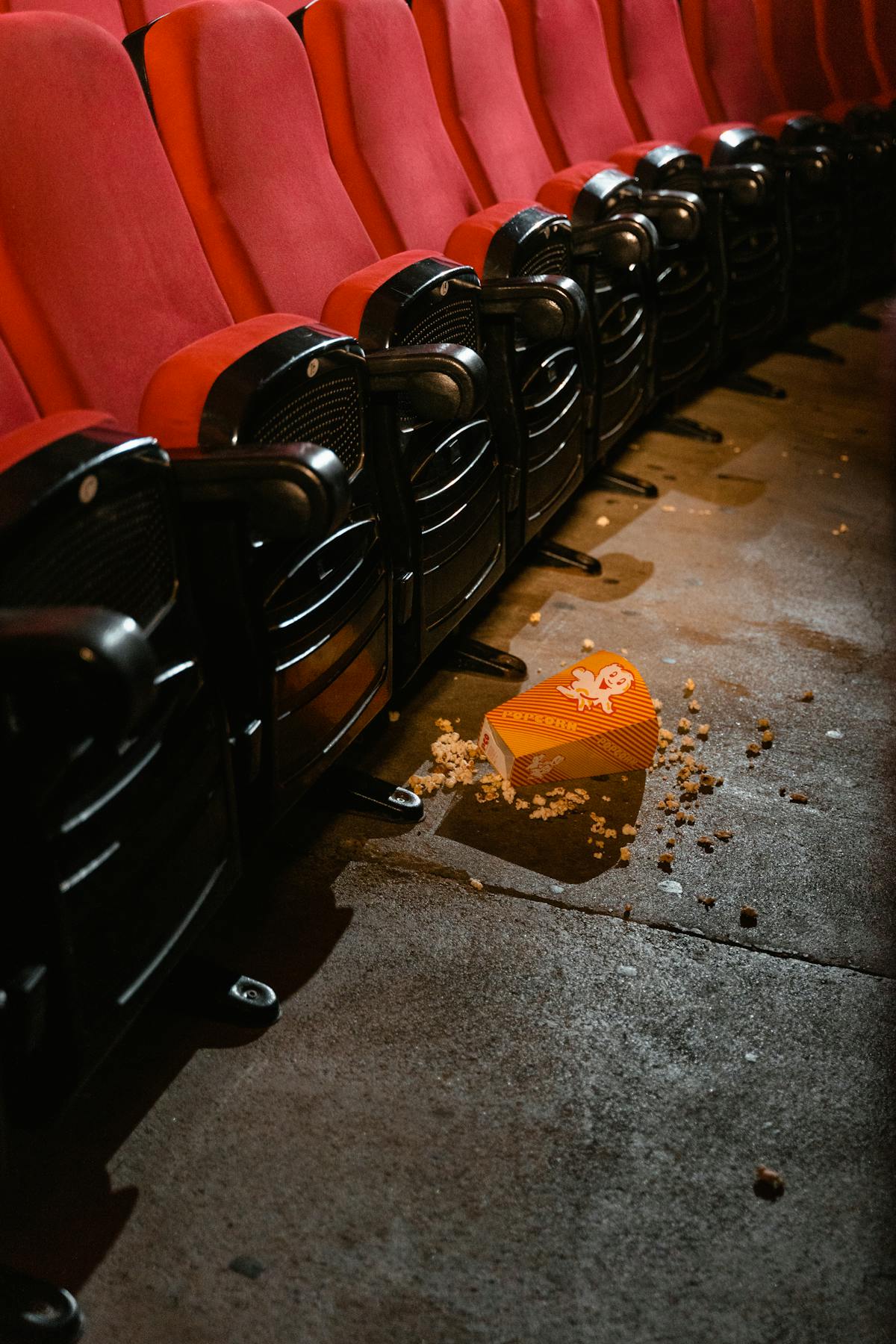 Mystery thriller cinema poster wall in a movie theater lobby