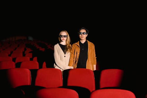 A Couple Inside a Movie House Wearing 3d Glasses