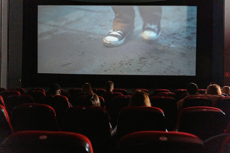 People Watching Movie At The Cinema